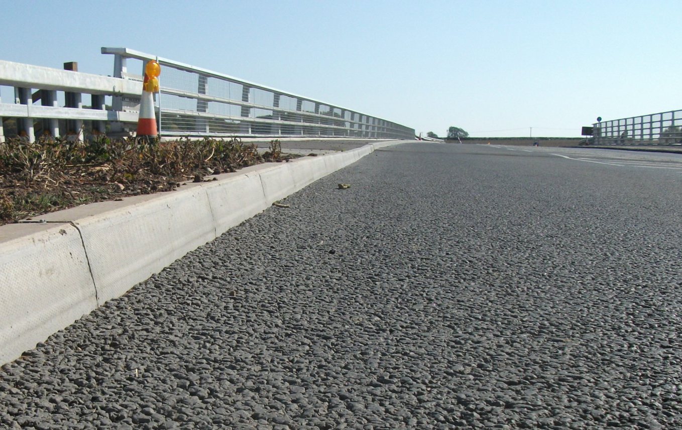 Dip visible in NW kerb line