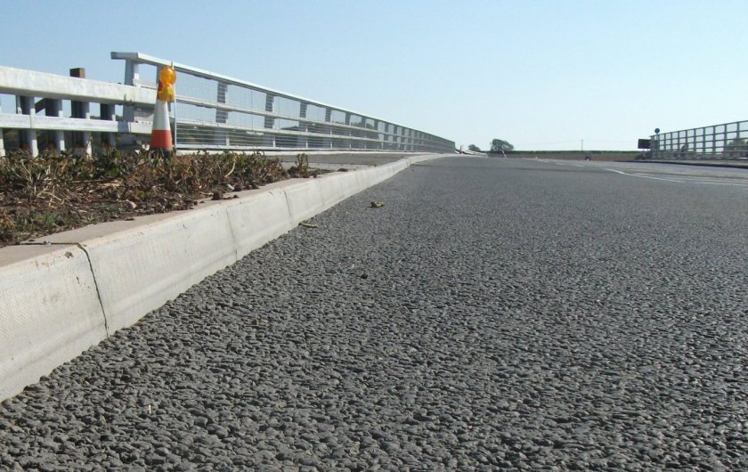 Dip visible in NW kerb line